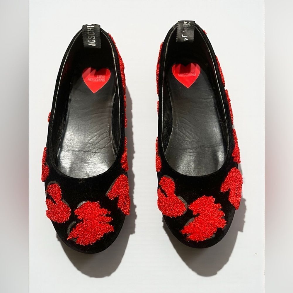 Love Moschino Black Flats with Red Heart Accents